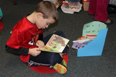 Braylen Vallier, in Wendy Gebben’s kindergarten class at Tobey Elementary, prepares for the national reading challenge.