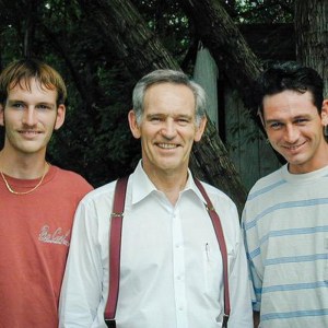 Allan David Bates stands with his sons.