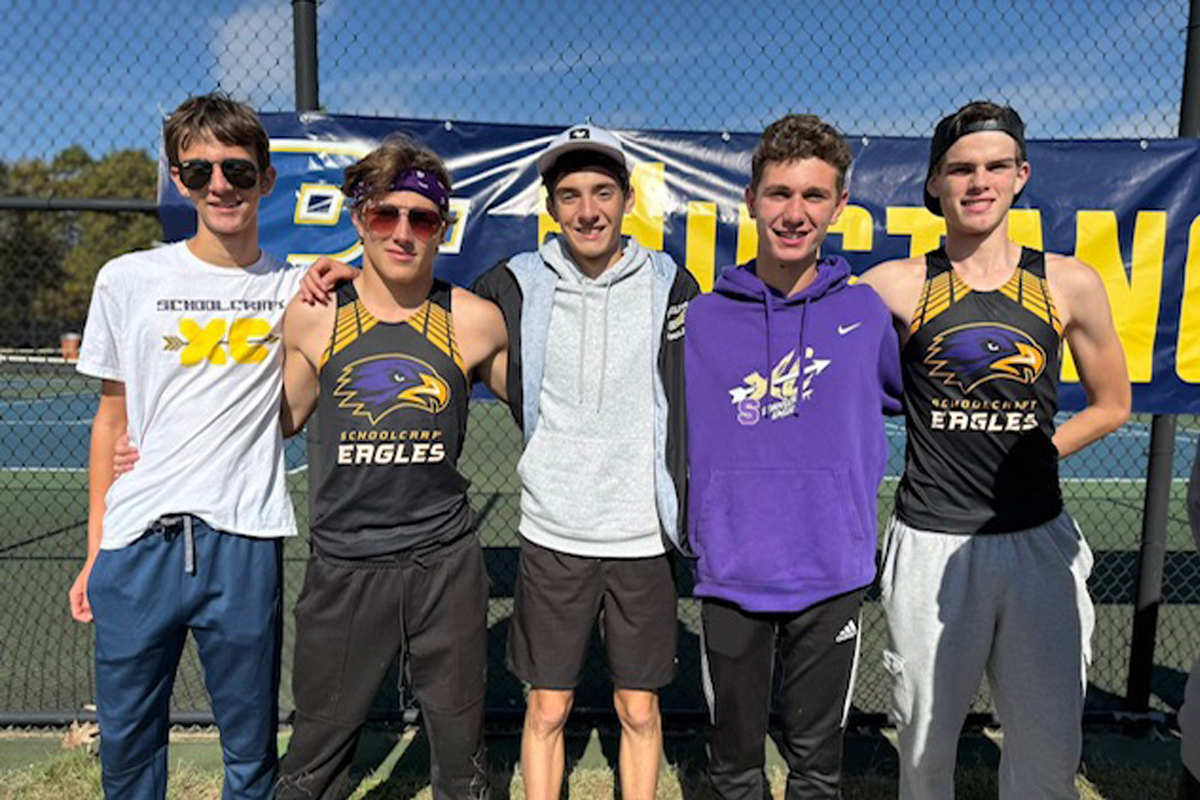 Five teens in athletic clothes.