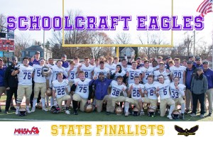 The state finalist football team lines up in their purple and white uniforms.