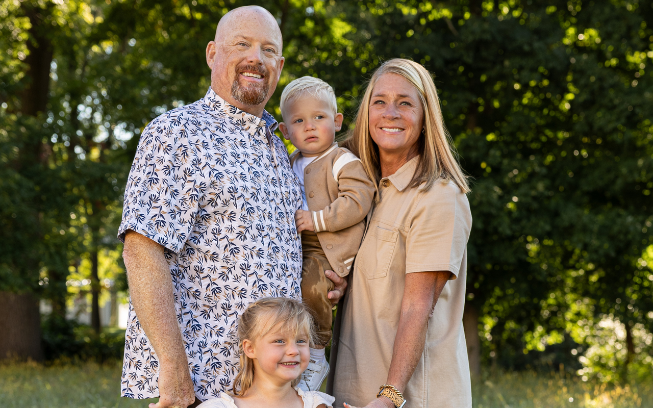 A couple with two young grandchildren.