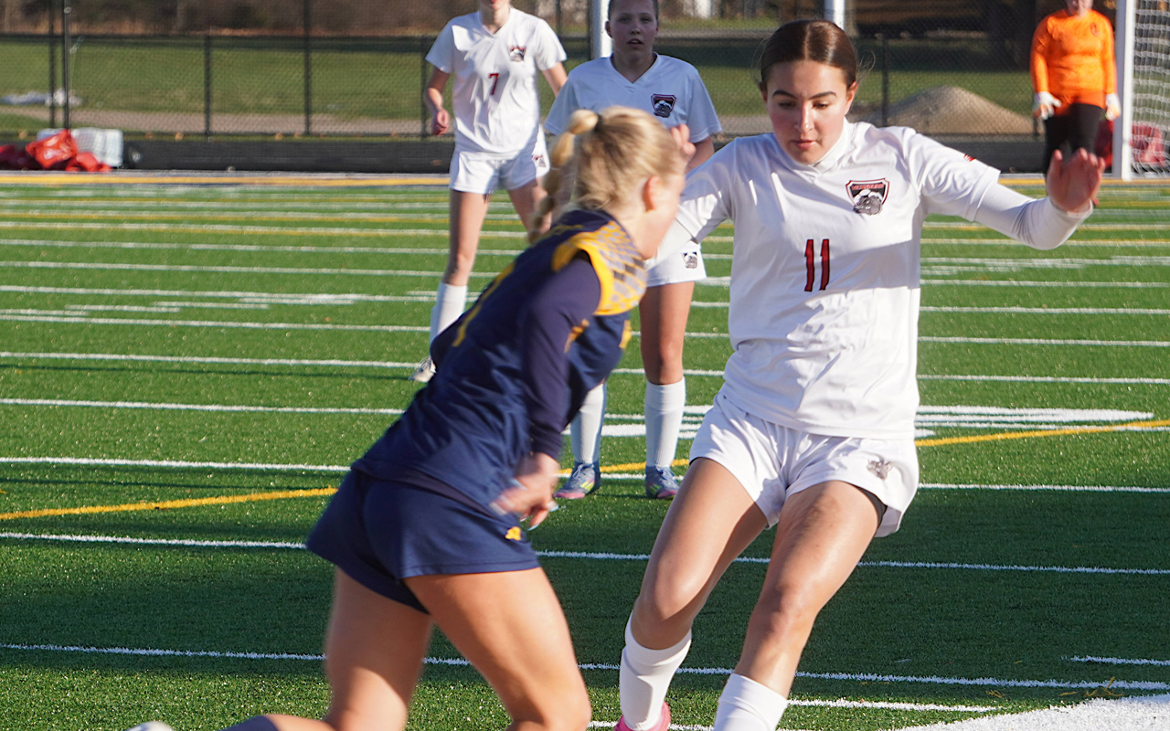 vix_soccer Two soccer players battle for the ball.