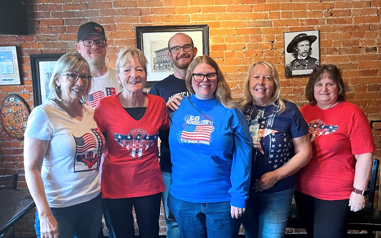 schoolcraft4thofjulycommittee A group of men and women in patriotic shirts.